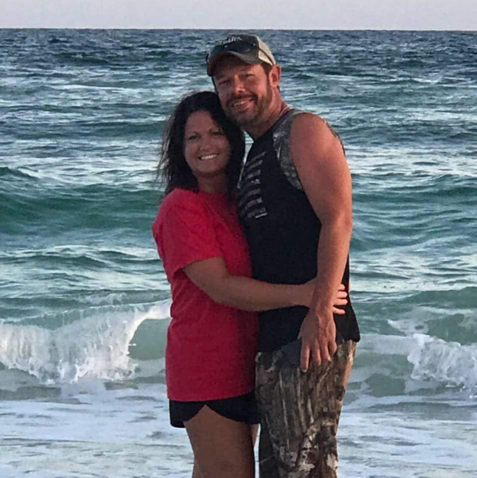 Shawn Chatham and his wife together at the beach