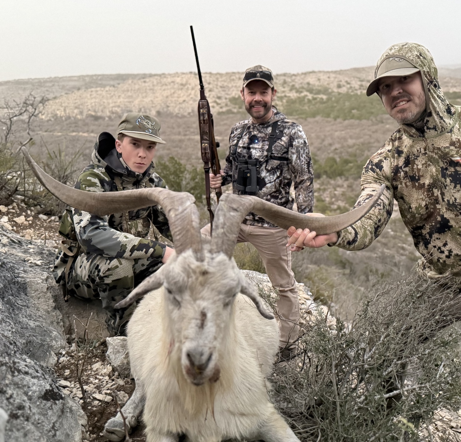 A group sharing an outdoor hunting moment